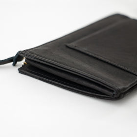 a(アー)フレームクラッチ(がま口長財布)