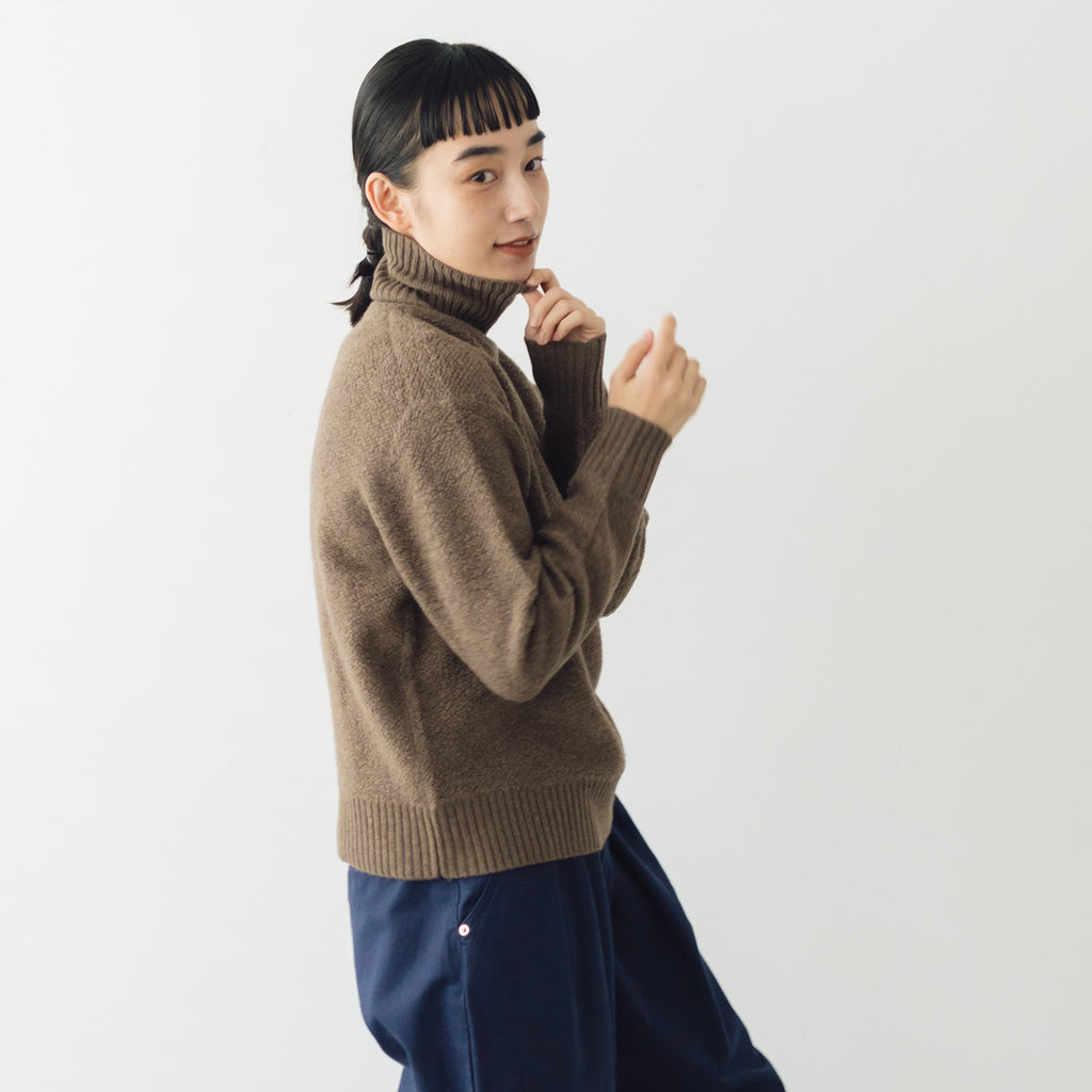 HAU ニットトップス "wool pile"