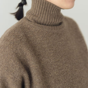 HAU ニットトップス "wool pile"