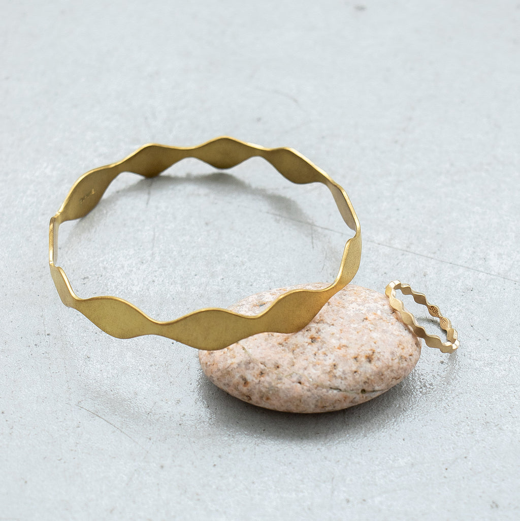 SURUME. Une brass ring