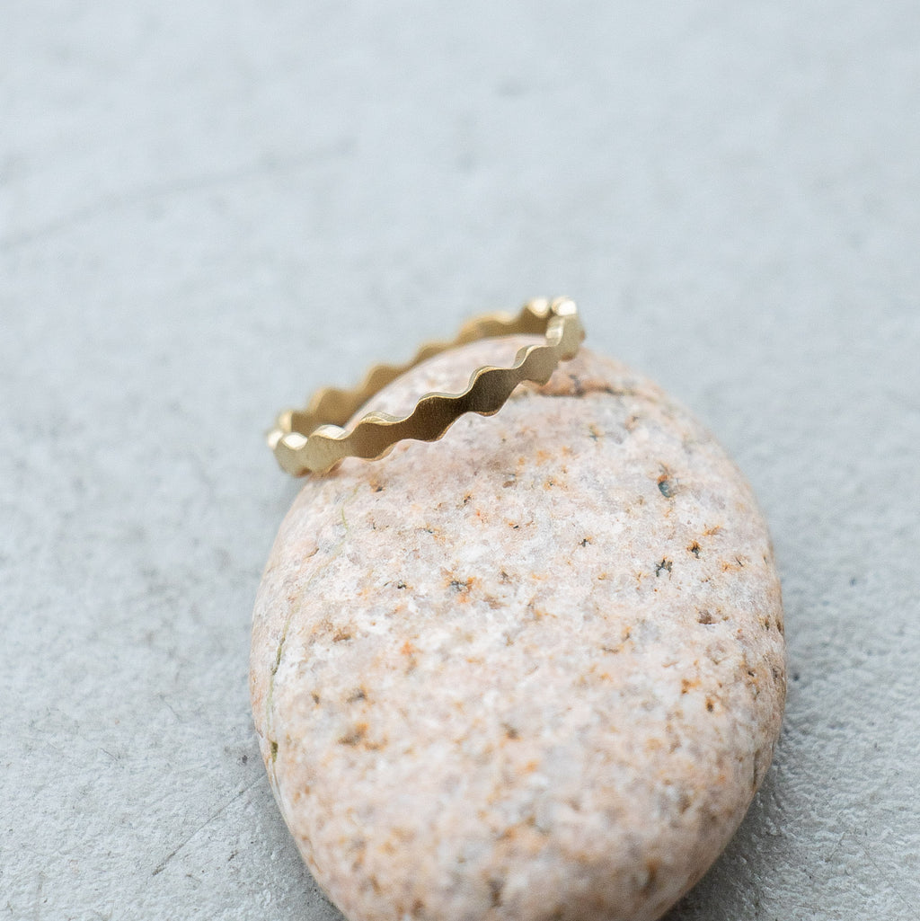 SURUME. Une brass ring