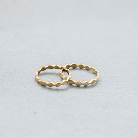 SURUME. Une brass ring