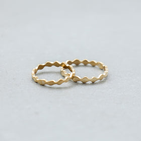 SURUME. Une brass ring