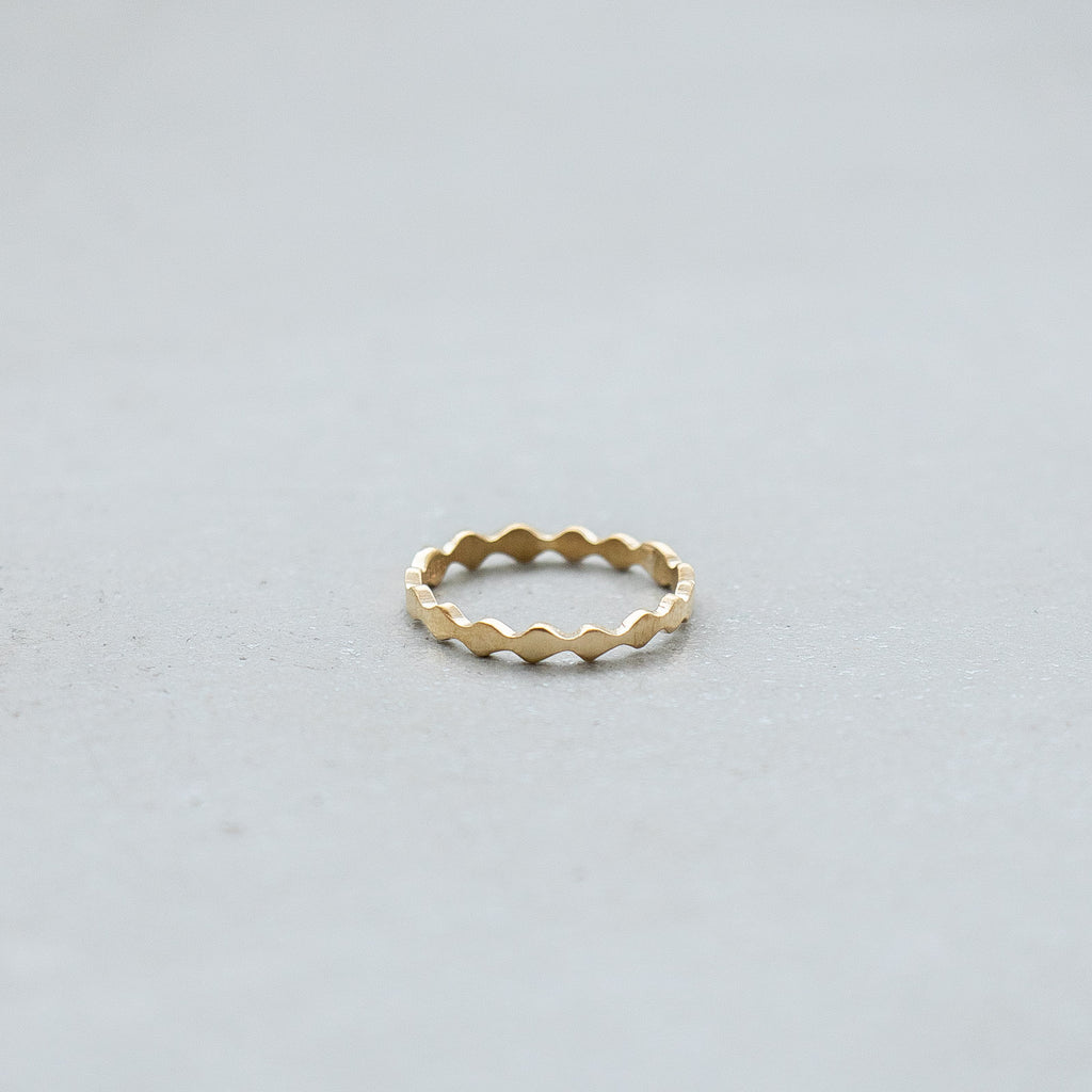 SURUME. Une brass ring
