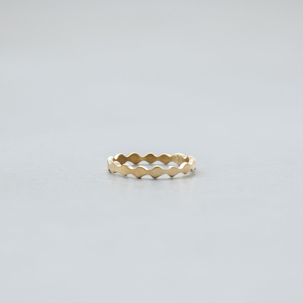 SURUME. Une brass ring