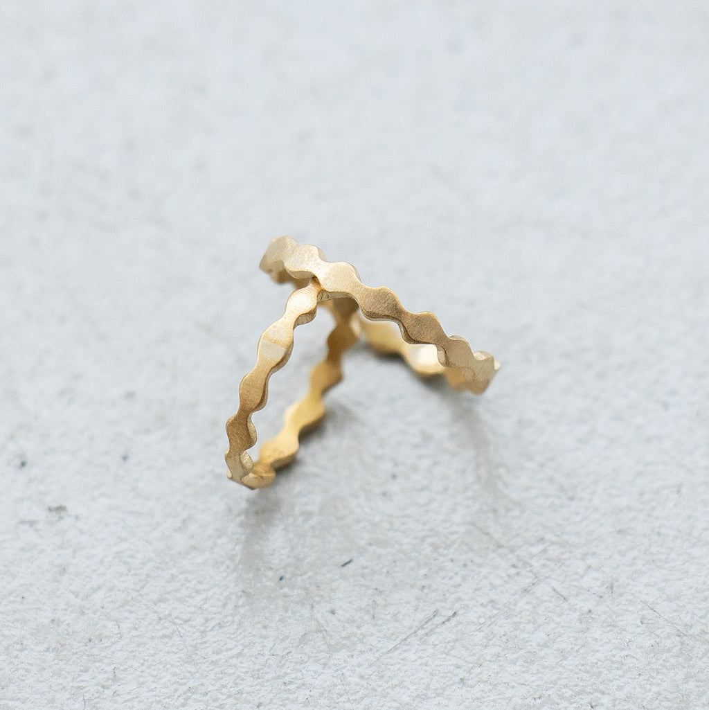 SURUME. Une brass ring