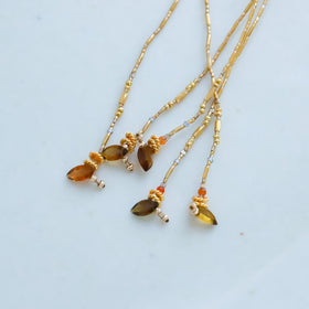 曉 ater アミュレット ブレスレット オレンジ