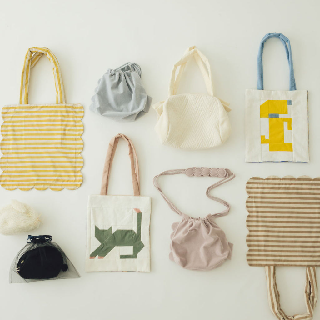 chitose.K scallop kincyaku bag