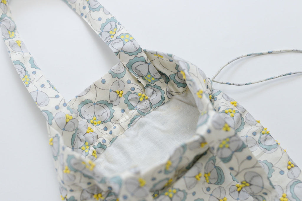 BUNON エンブロイダリードローストリングバッグ シルク