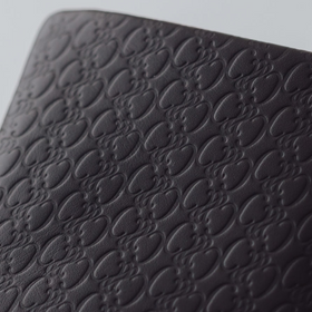 COSMIC WONDER monogram embossed light leather wallet