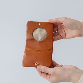 COSMIC WONDER monogram embossed light leather  bifold coin case