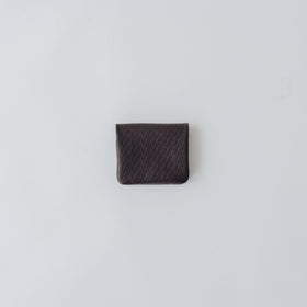 COSMIC WONDER monogram embossed light leather  bifold coin case