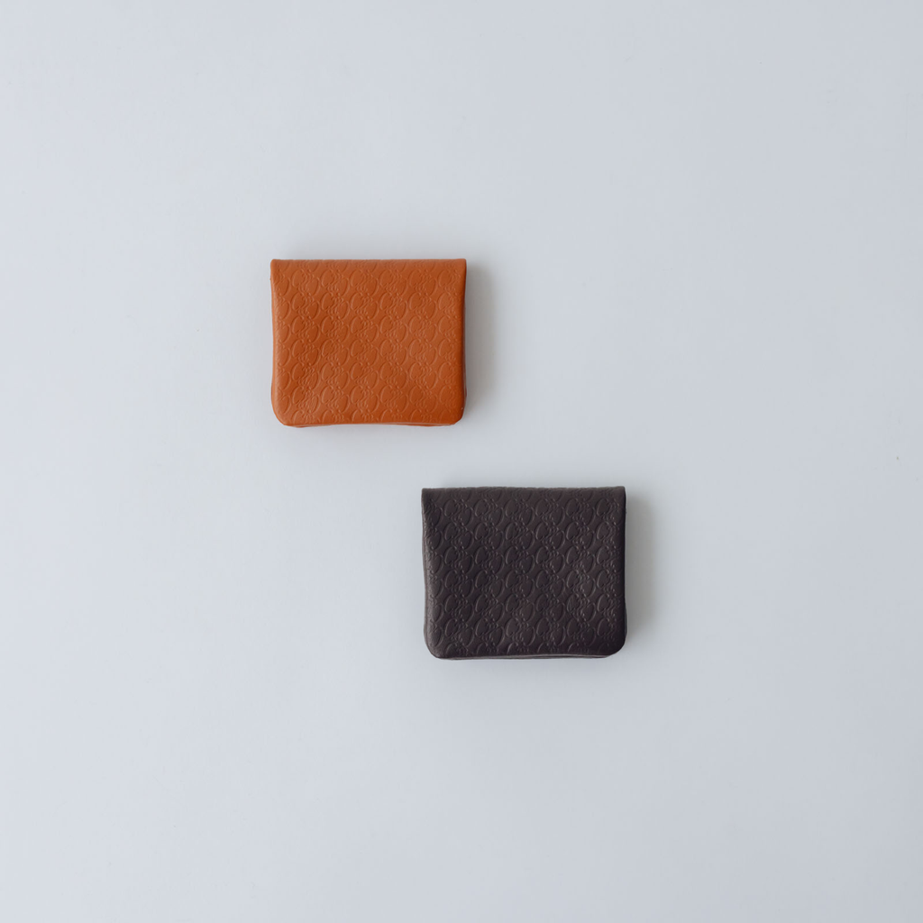 COSMIC WONDER monogram embossed light leather  bifold coin case