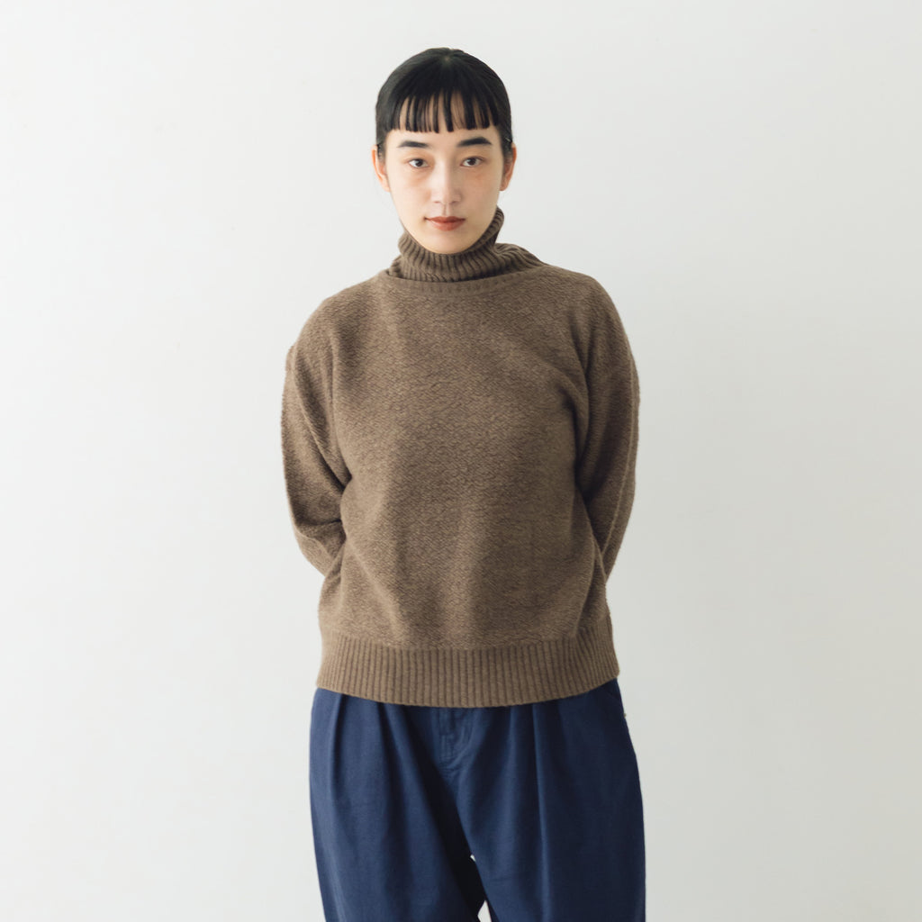 HAU ニットトップス "wool pile"