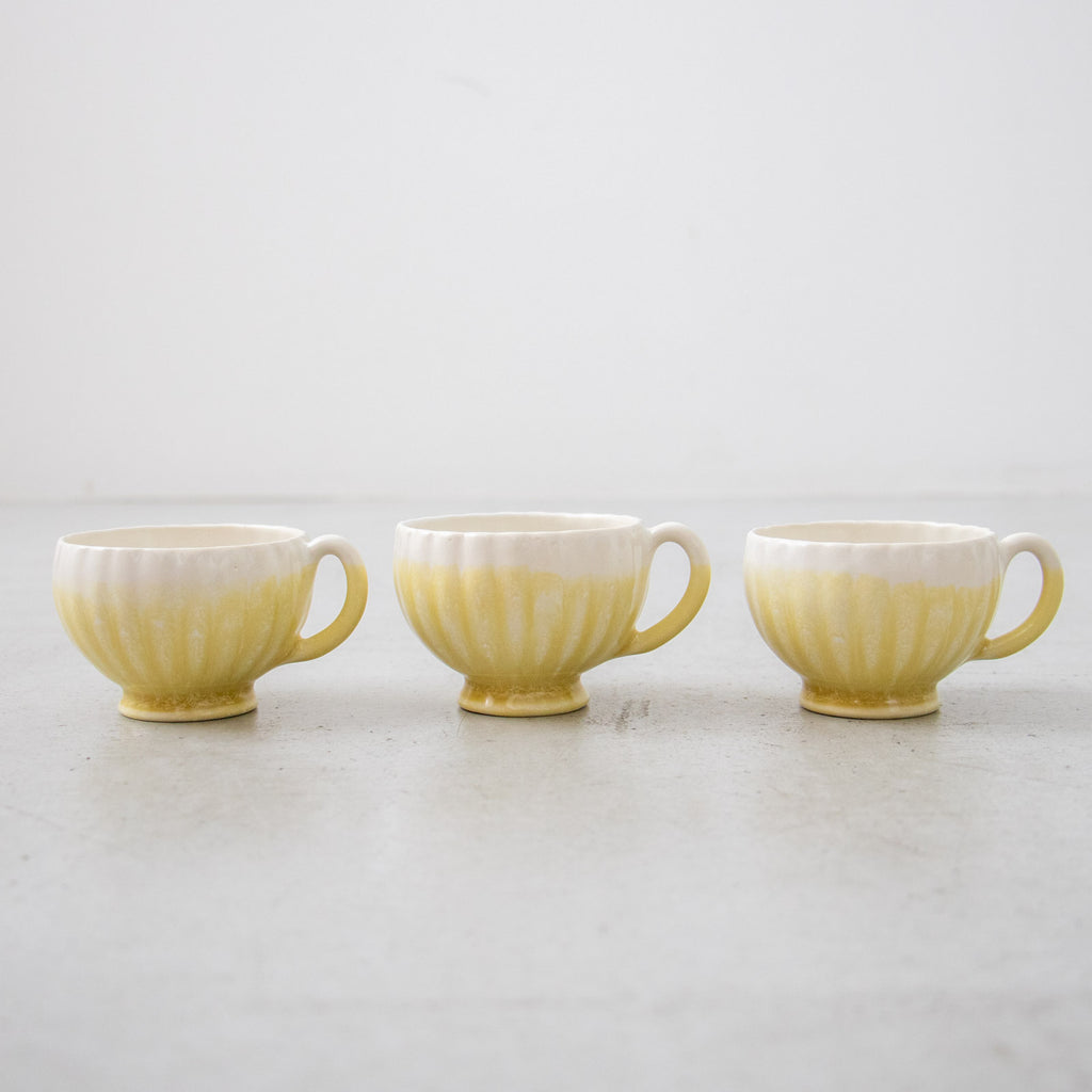 河合竜彦 黄釉掛分 輪花手付茶杯