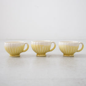 河合竜彦 黄釉掛分 輪花手付茶杯