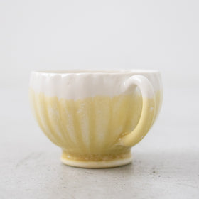 河合竜彦 黄釉掛分 輪花手付茶杯